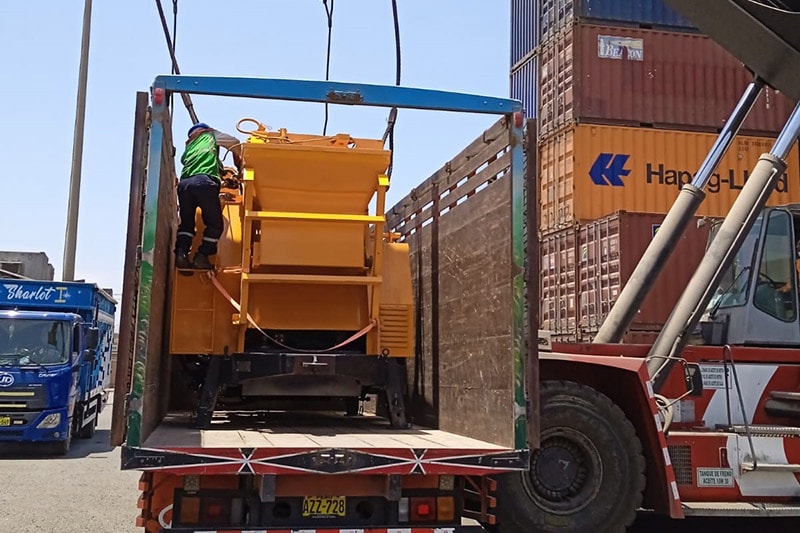 Deliver concrete mixer pump to working site