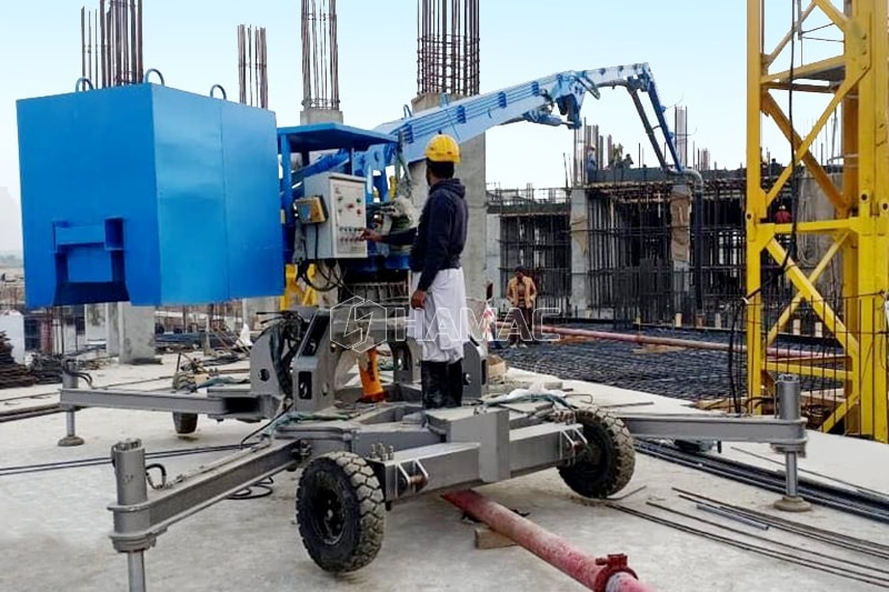 Spider beton placing boom dengan roda