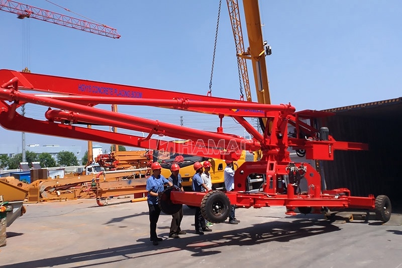 Mobile beton placing boom dimuat ke dalam kontainer